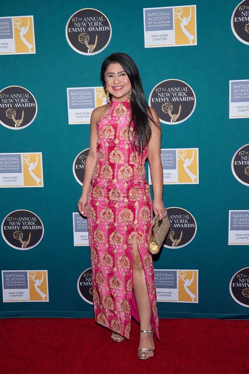Aditi Lamba at the New York Emmy Awards wearing a pink and gold dress.